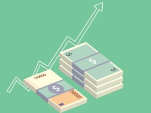 Dinheiro empilhados com seta simbolizando crescimento do dinheiro investido.